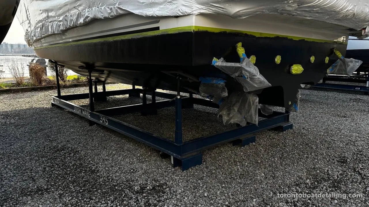 Boat on stands in a Toronto storage yard, prepared by Toronto Boat Detailing